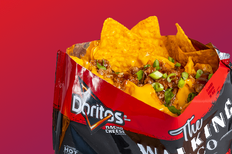 Bag of Doritos with nacho cheese, pulled pork, and green onions