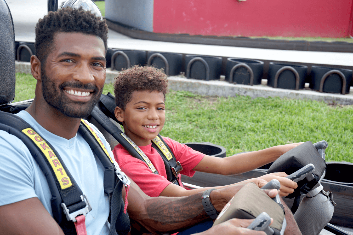 Father and son on Go Kart at Boomers