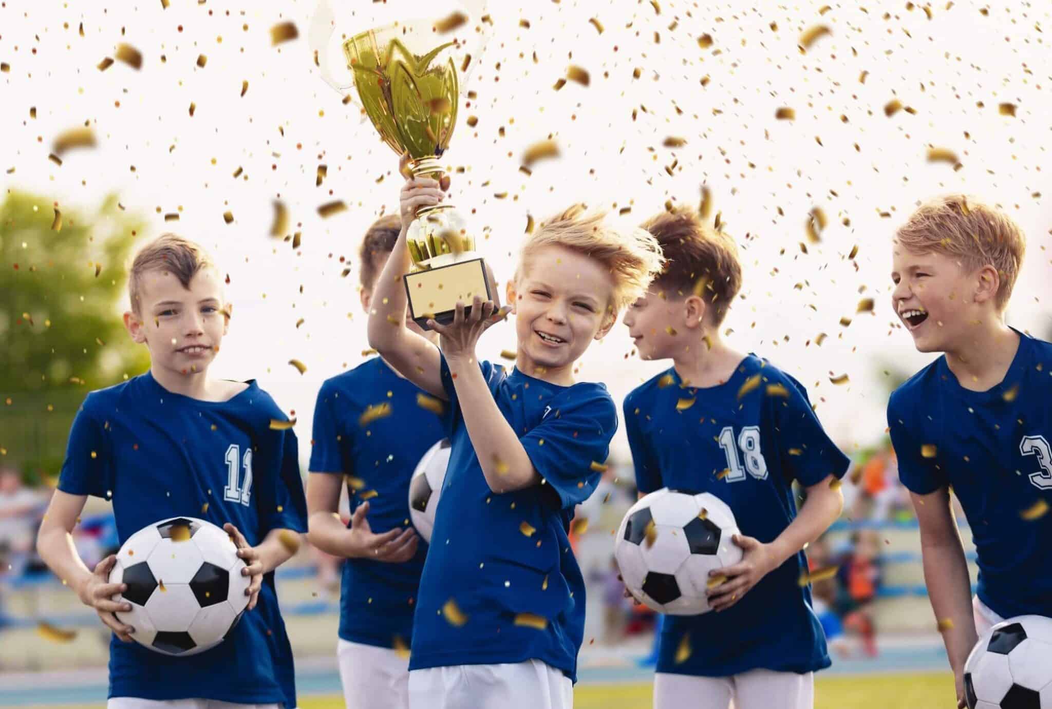 Sports Team Celebrating a win with a trophy