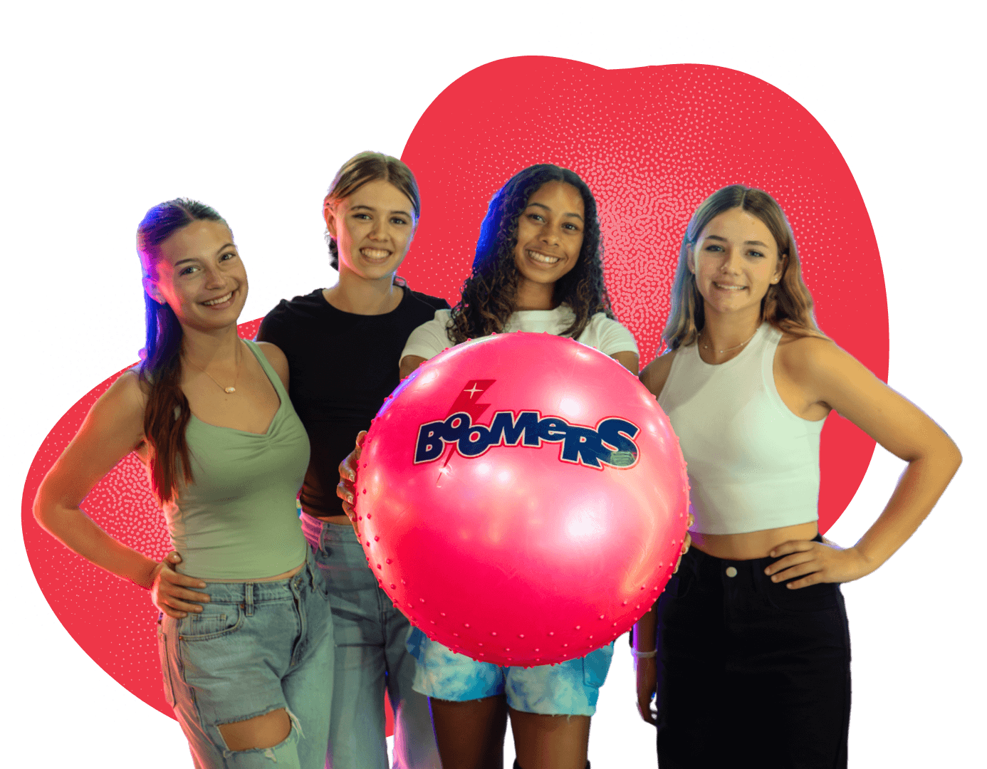 Four friends at Boomers Park with an arcade prize