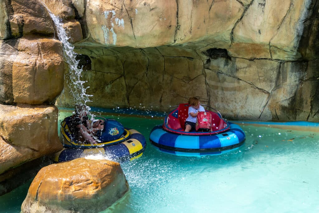 Bumper Boats going through a waterfall at Boomers Boca