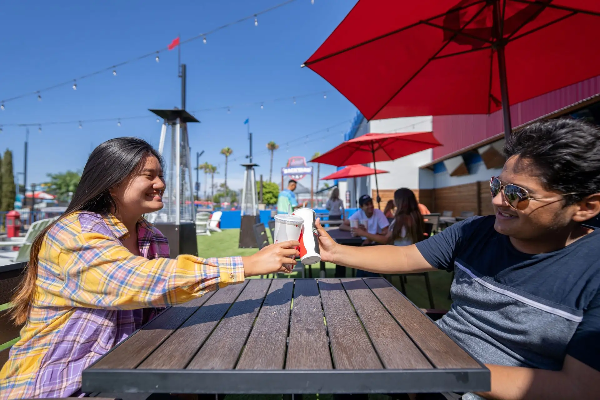Couple sitting at table Boomers Backyard