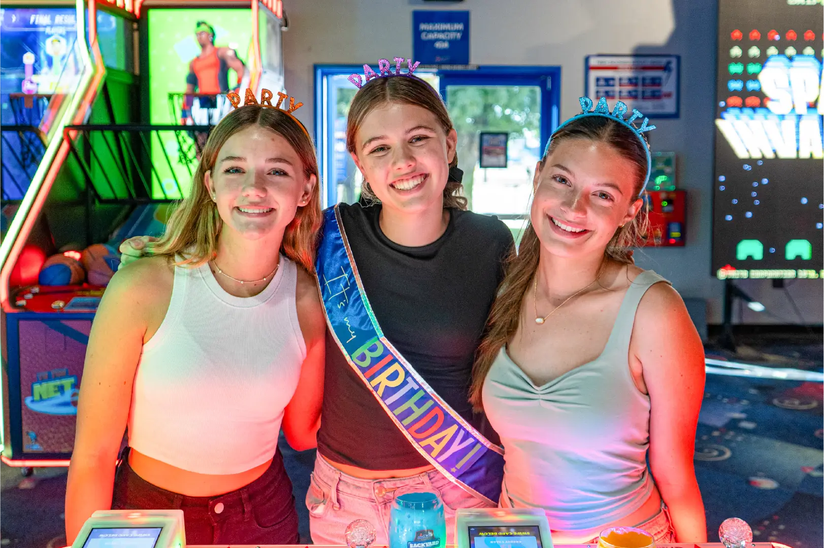 teen girls at a Boomers birthday party